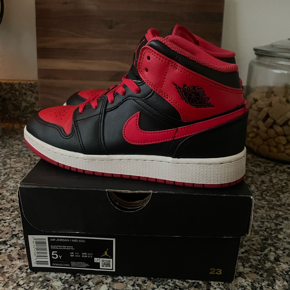 Air Jordan 1 Mid Black and Red Sneakers